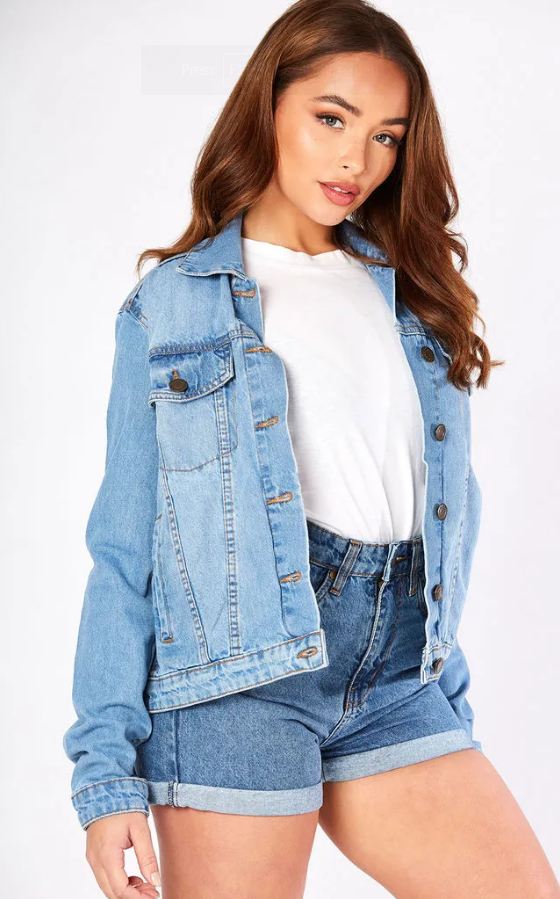 Stylish light blue denim jacket for women, featuring a classic design with button closures, long sleeves, and a crop fit.