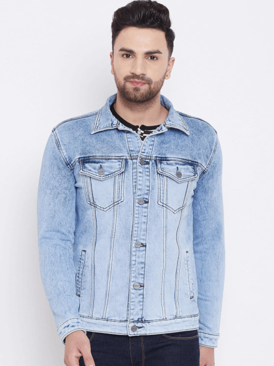 Light blue denim jacket with front button closure and chest pockets worn by a male model with a beard.
