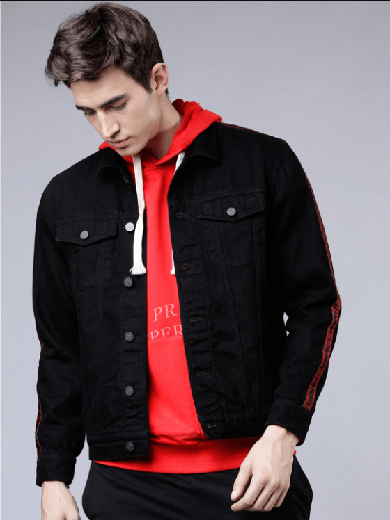 Stylish men's black denim jacket with red hoodie shown on model
