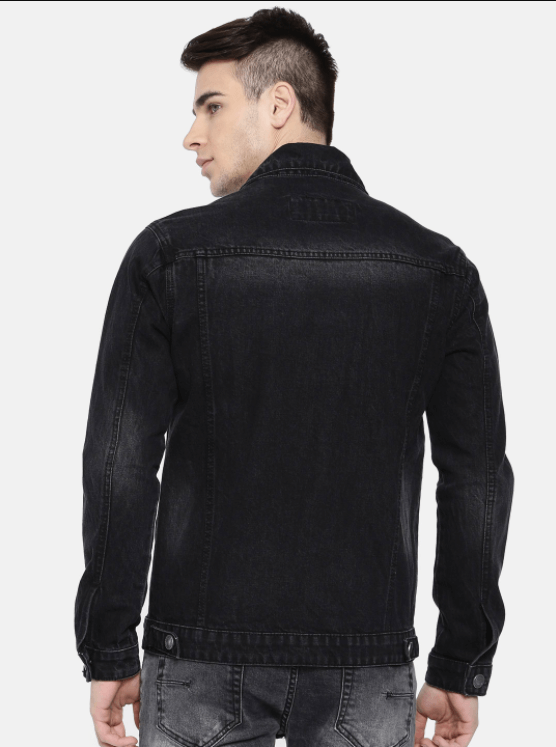 Black denim jacket with lapel collar, shown on male model in studio setting.