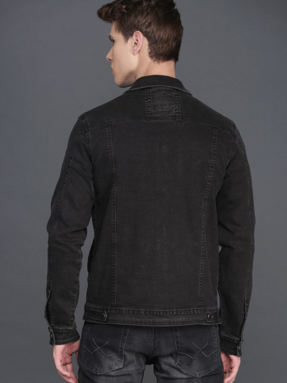 Rugged black denim jacket for men, featuring a classic collar and button closure for a stylish, casual look.