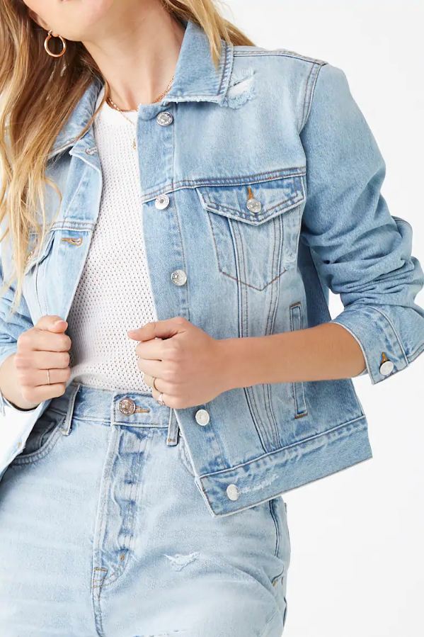Light blue women's denim jacket from Ace Cart, featuring classic button-up design and front pockets.