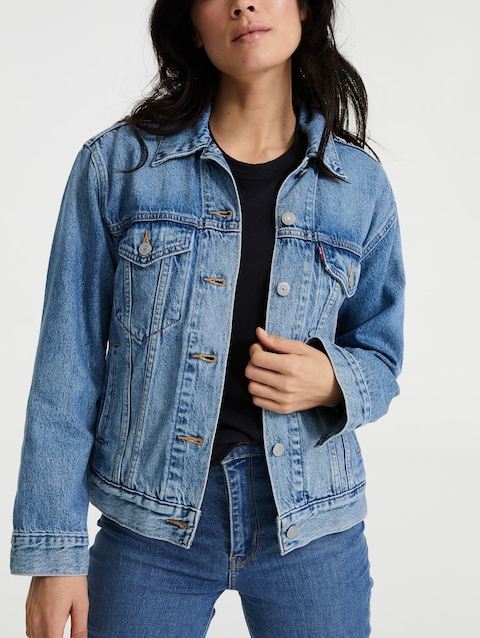 Stylish blue denim jacket for women, featuring a classic collared design and button-up closure for a timeless look.