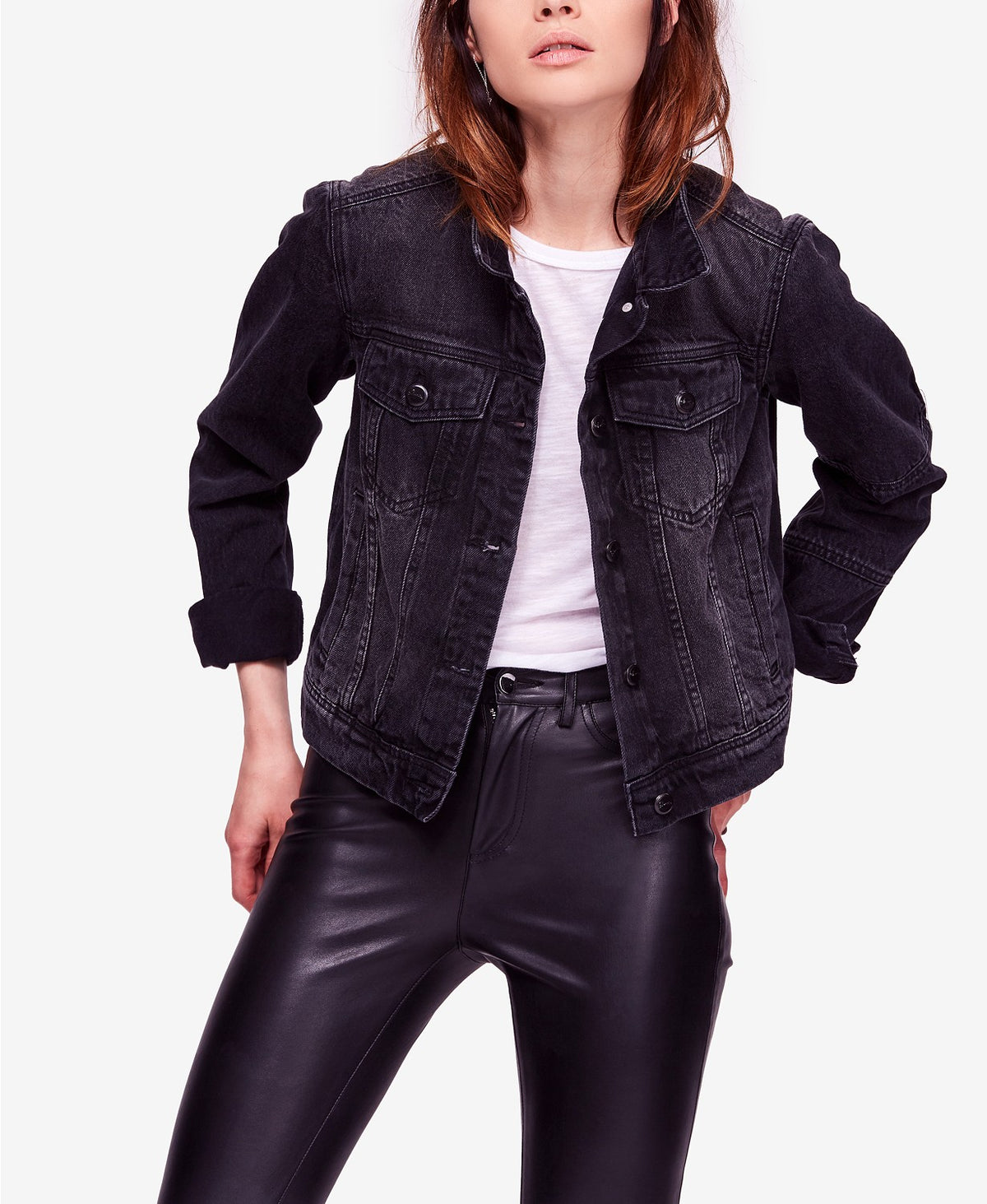 Stylish Women's Black Denim Jacket - Cropped denim jacket with pockets and button closure, worn by a young woman with dark hair in a casual outfit.