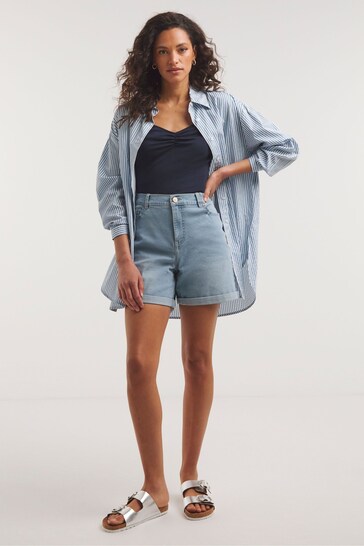 Ace Cart Women's Light Wash Denim Mini Skirt with Pockets