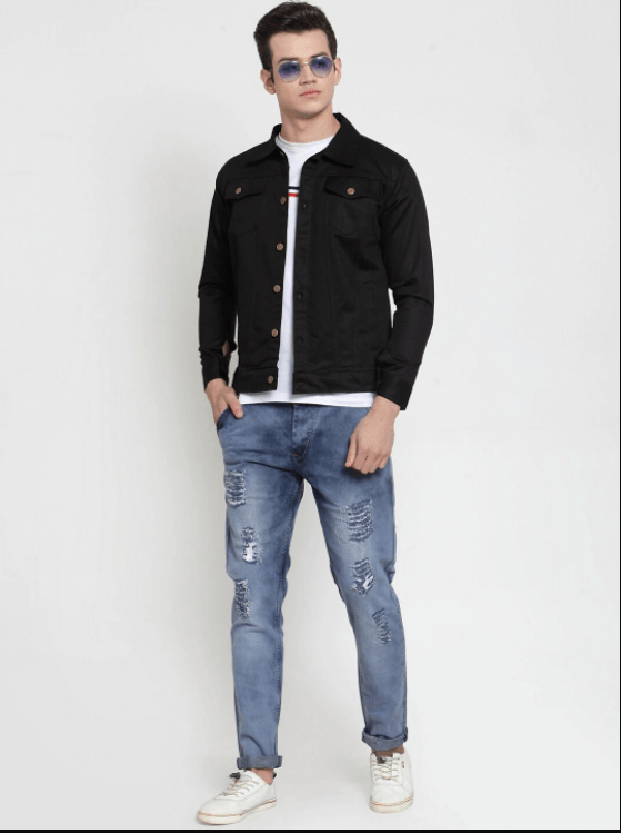 Black denim jacket worn by stylish male model against white background
