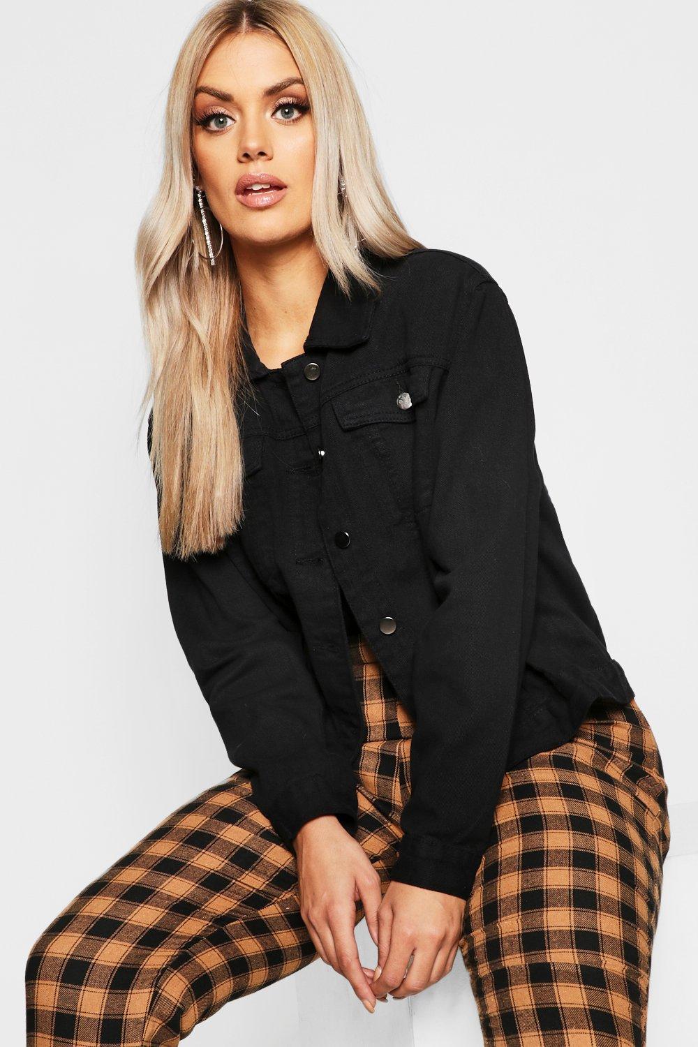 Black Denim Jacket on Blonde Woman in Front of Checkered Background