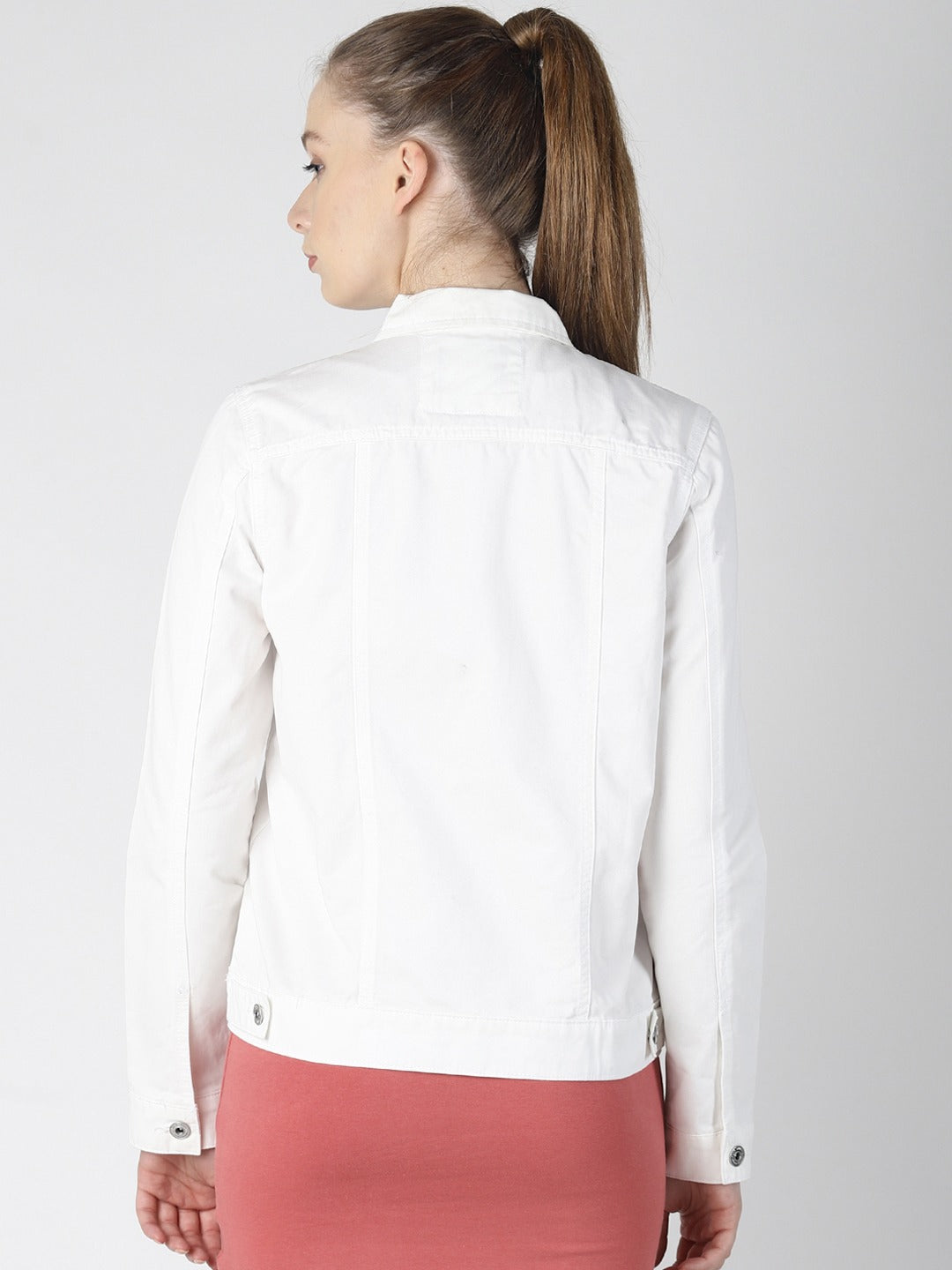 White denim jacket for women, featuring a solid color design, perfect for casual or smart-casual outfits.