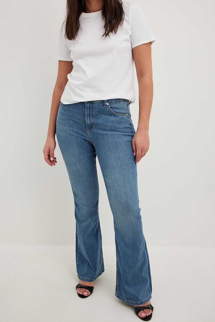 Flared High Waist Stretch Jeans - Quality denim jeans with a flared silhouette and high-waist design, perfect for a casual yet stylish look.