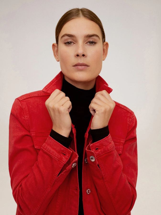 Stylish red women's denim jacket with chic collar and button closures.
