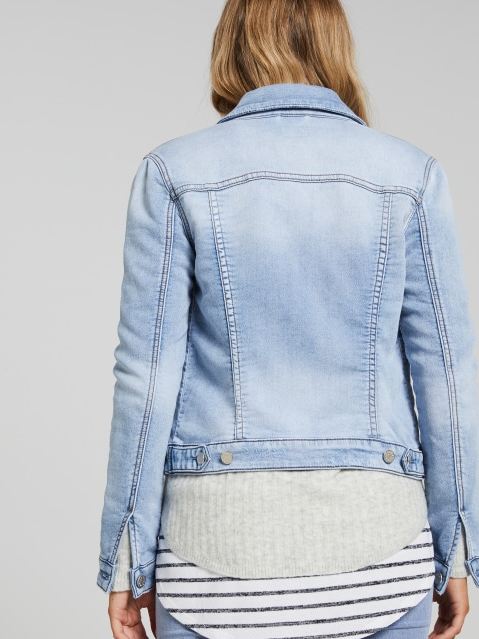 Light blue denim jacket with tailored, fitted design for stylish women's outfit