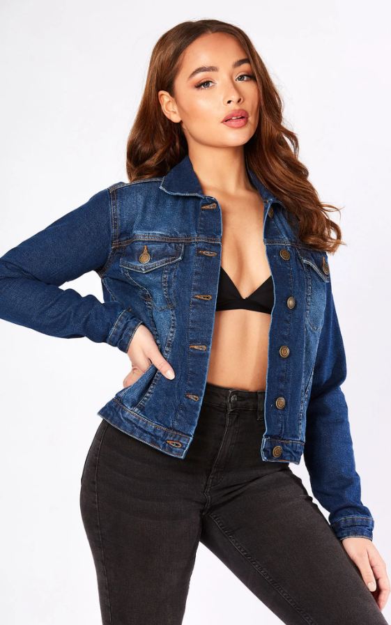 Dark blue denim jacket for fashionable women, featuring a classic jean jacket design with button closures.