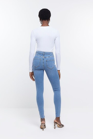 Stylish light blue high-rise jeggings from Ace Cart, featuring a slim fit and stretchy fabric for a comfortable, flattering look.