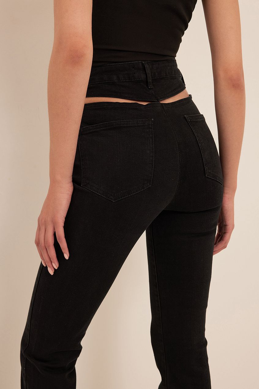 High-waist black denim jeans with cut-out detail at the back from Ace Cart