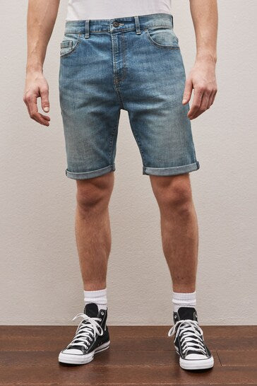 Vintage-Inspired Distressed Denim Shorts by Ace Cart