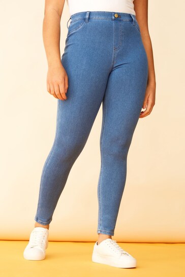 Ace Blue Comfort Midwash Jeggings with high waist and slim fit design on model