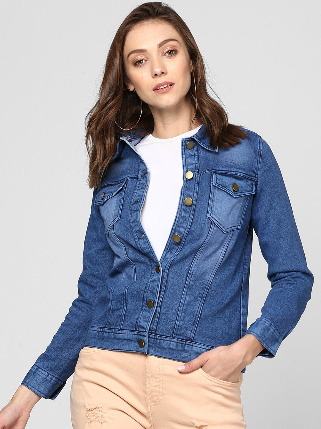 Stylish denim jacket for women, blue solid color, button-down design, casual chic apparel.