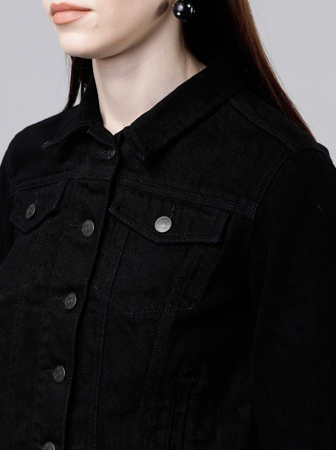 Black solid women's denim jacket with multiple pockets and metal buttons