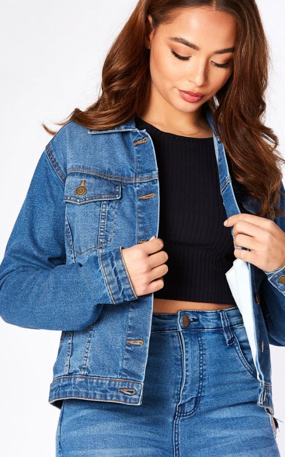 Stylish denim jacket for women, blue solid color, cropped design, fashion accessory.