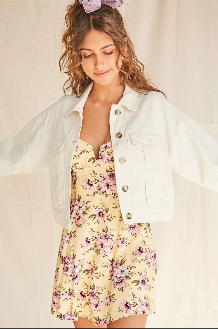 Stylish white denim jacket with floral summer dress, showcasing fashionable women's apparel from Ace Cart.