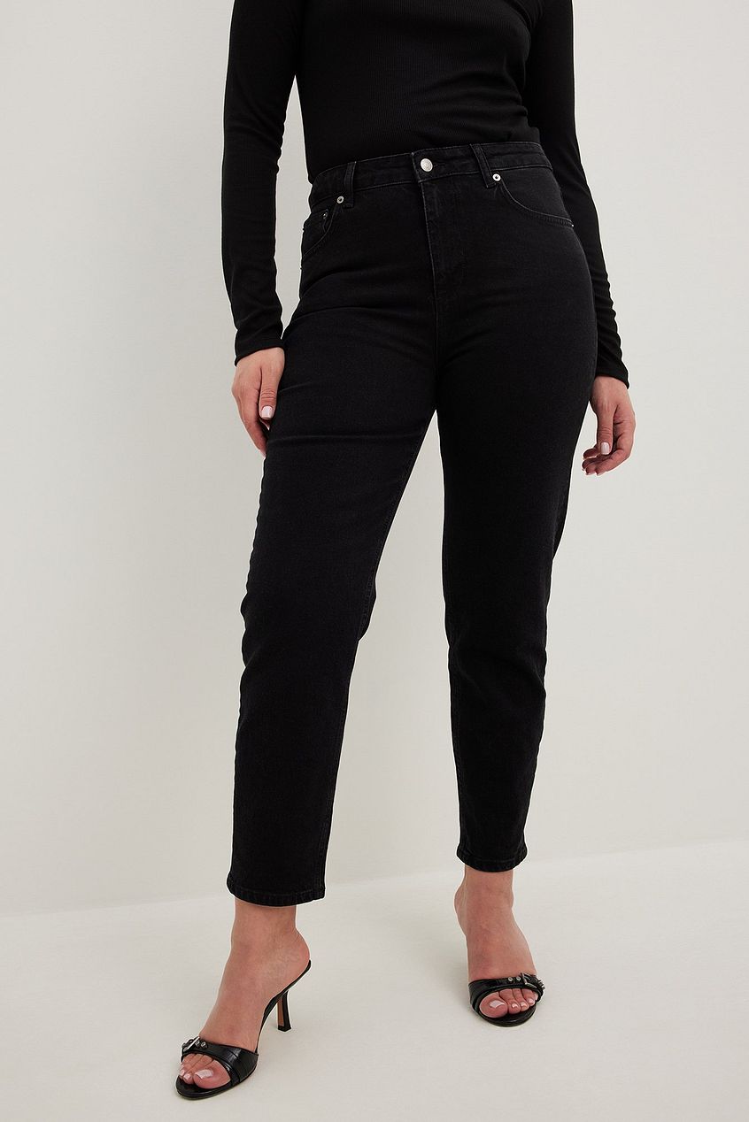 High-waisted black jeans with a classic straight-leg silhouette, featuring a streamlined design and chic, modern appeal for the confident, stylish woman.