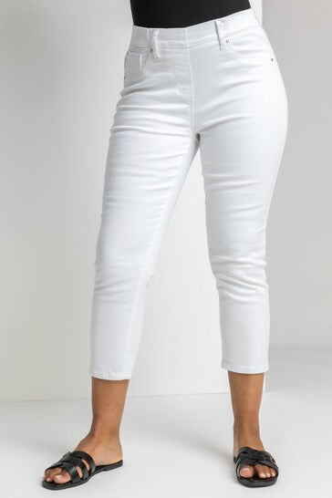 Slim-fit white cropped jeggings with stretch fabric for comfortable wear.