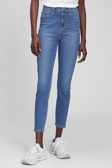 Stylish high-waisted favorite jeggings with a ripped knee detail, showcasing a modern and trendy look.