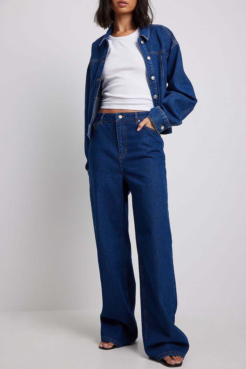 Dark denim jacket and high-waisted wide-leg jeans from Ace Cart, featuring classic blue denim, modern silhouette, and understated style.