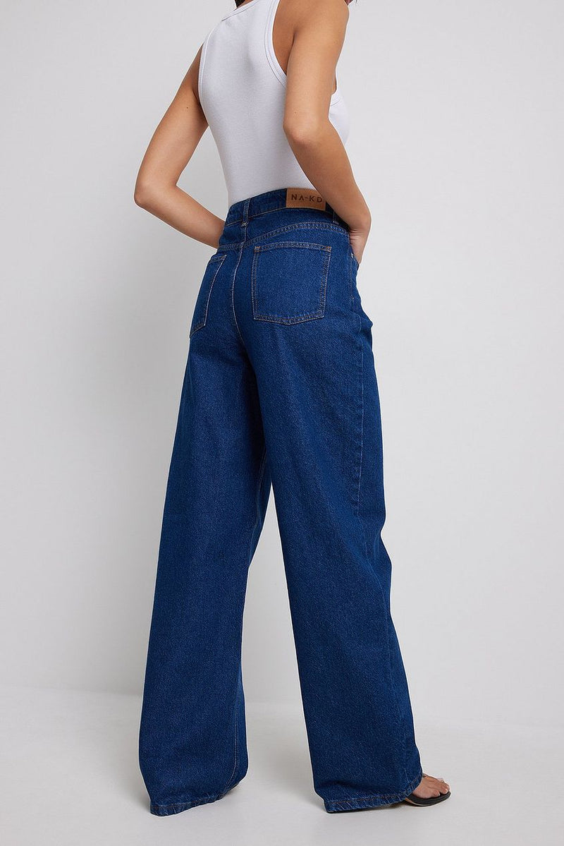 High-waist denim jeans with a wide leg silhouette shown on female model