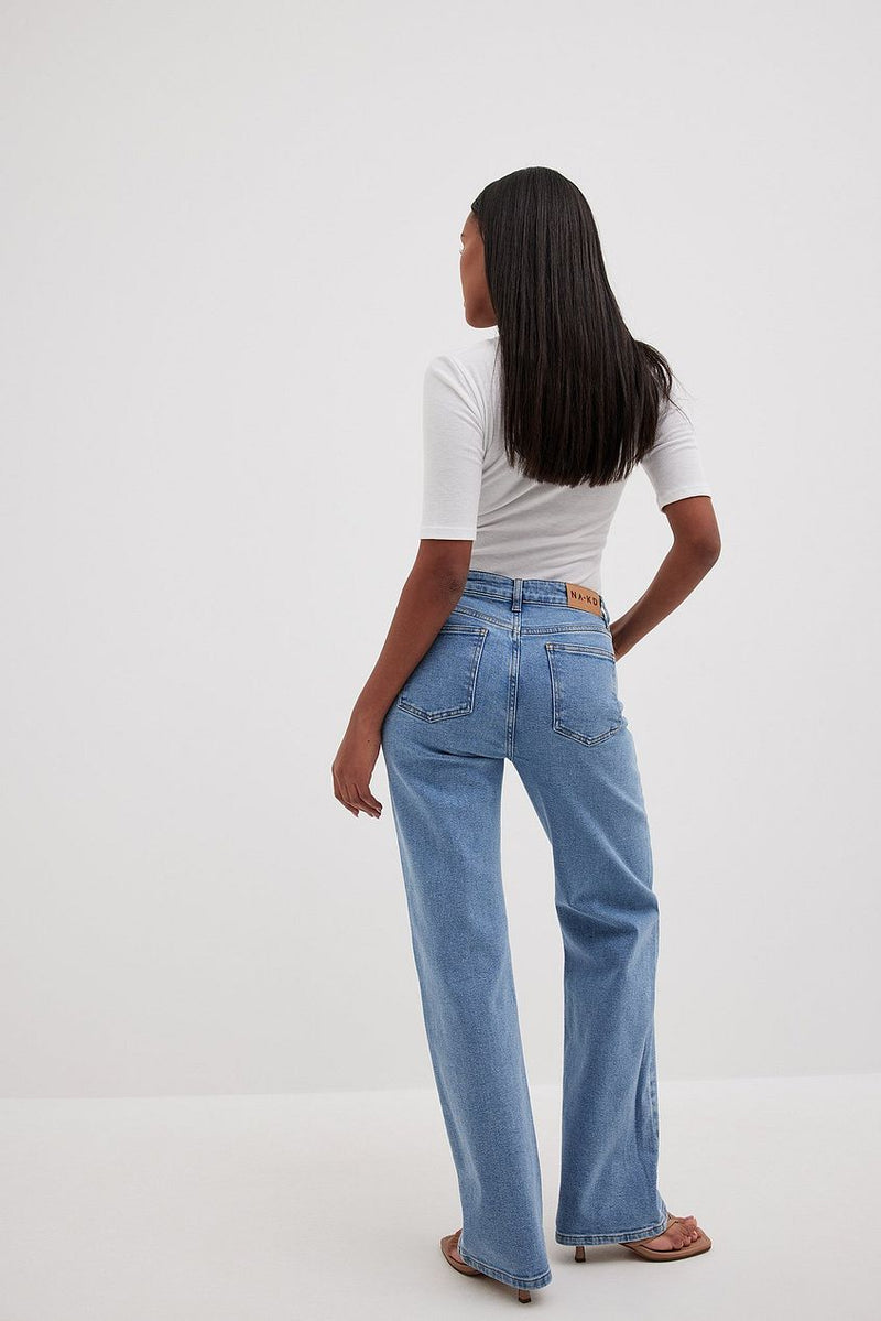 Stylish Mid Waist Denim Jeans on Female Model