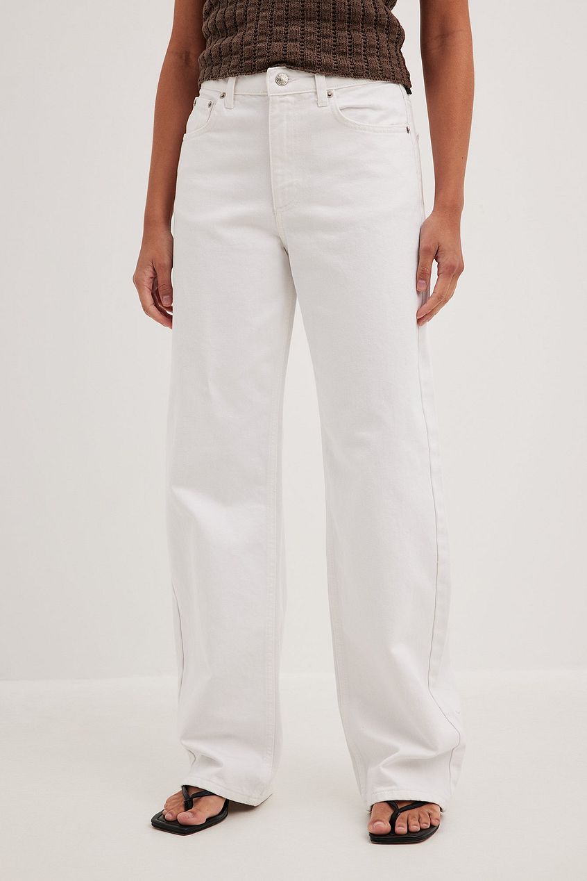 Relaxed mid-waist white denim jeans with a straight leg silhouette, featuring a classic five-pocket design and a versatile, comfortable fit.