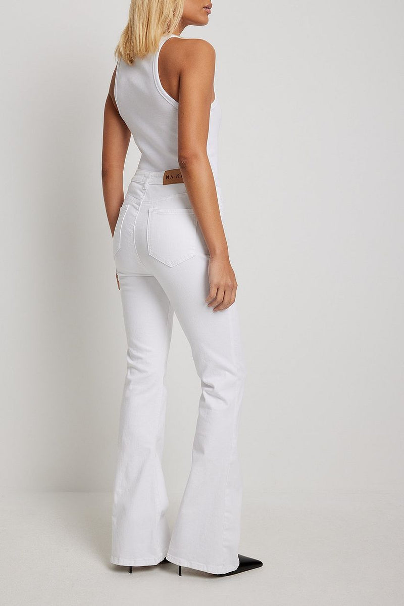 Flared high-waist white stretch jeans showcased on a female model with blond hair against a plain white background.