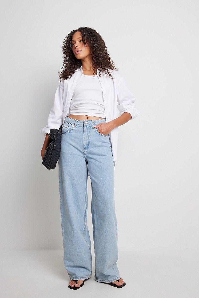 High waist wide leg denim jeans, relaxed fit white crop top, casual woman fashion outfit