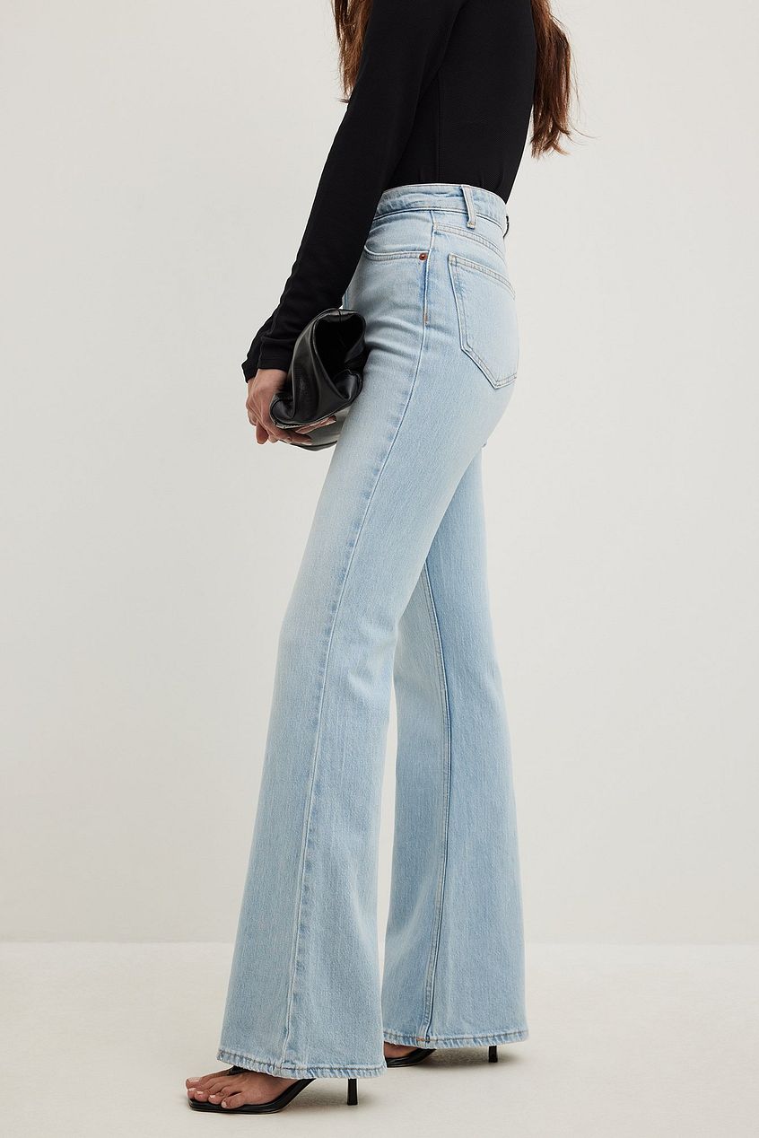 Flared high waist jeans from Ace Cart, featuring a light blue denim design and a relaxed, flattering fit.