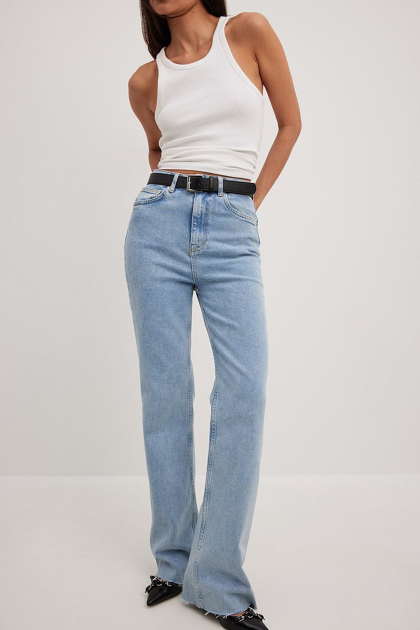 Flared High Waist Jeans - Relaxed fit, light-wash denim jeans with a flared leg silhouette and high-rise waistline for a flattering, stylish look.