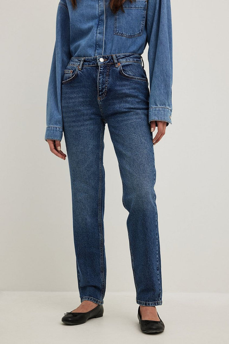 Slim Mid Waist Denim Jeans - Classic blue wash, straight leg design for a flattering fit, from Ace Cart's women's denim collection.