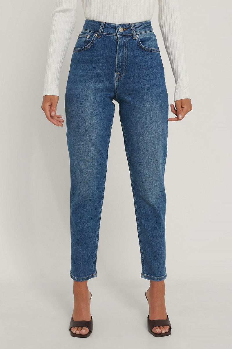 High-waist organic mom jeans, relaxed straight-leg design, classic denim blue color, suitable for versatile women's fashion.