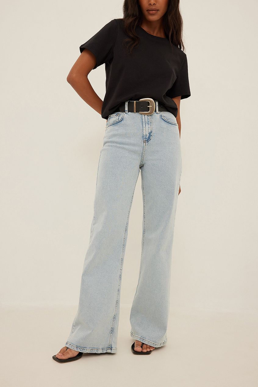 Relaxed Bootcut Fit Denim Jeans with Woman Wearing Black Top