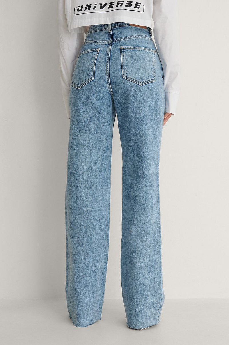 High-waisted straight fit raw hem denim jeans from Ace Cart clothing.