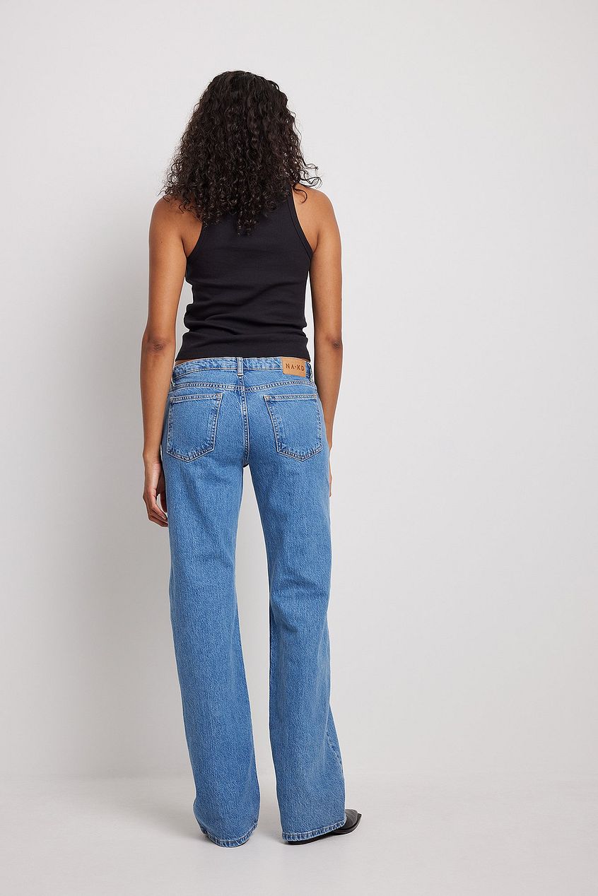 Super Low Waist Denim Jeans - Classic high-rise straight leg jeans in light blue wash, featured against a plain white background.