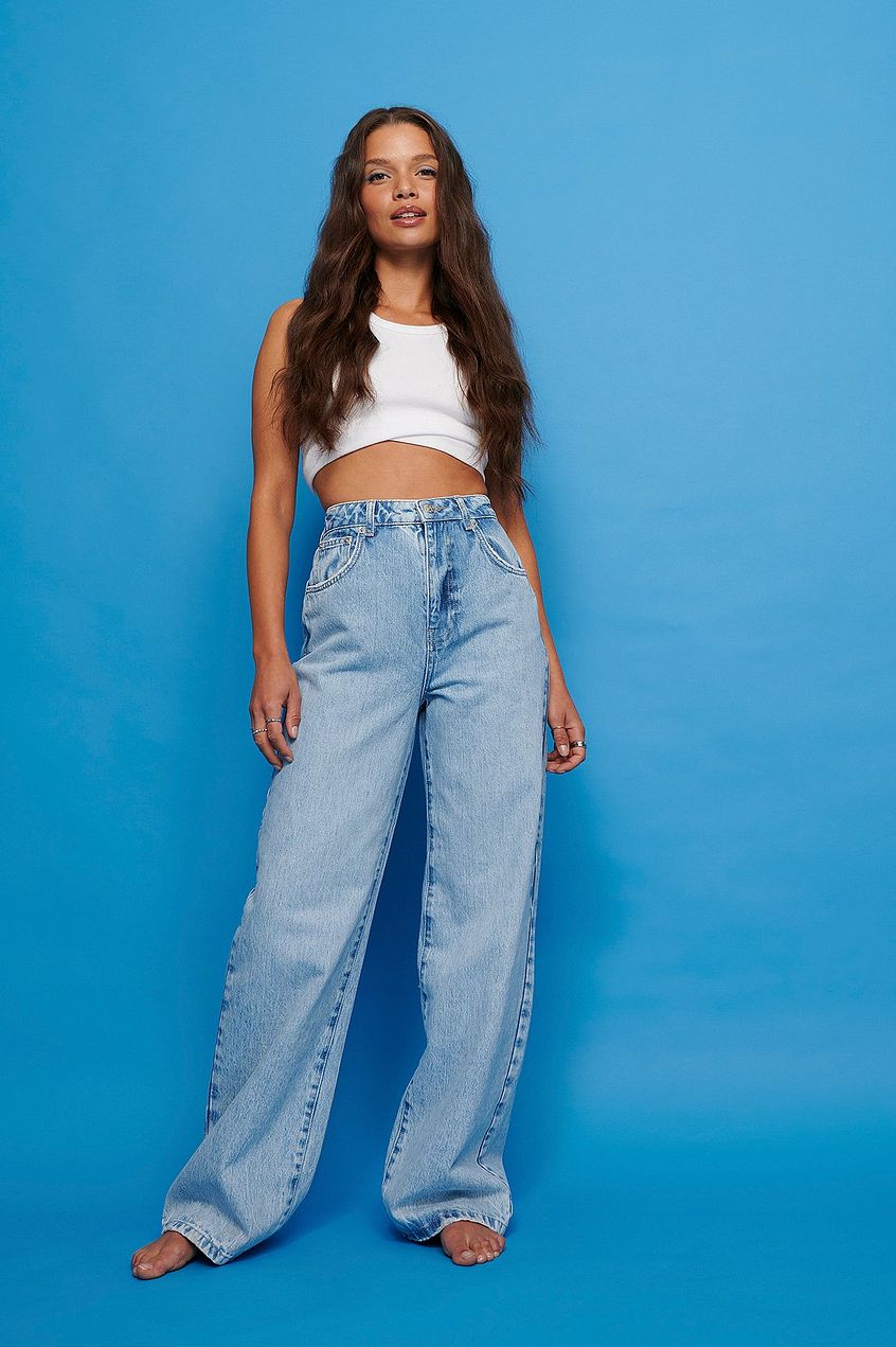 Stylish high-waisted wide leg denim jeans with relaxed fit and classic blue wash.
