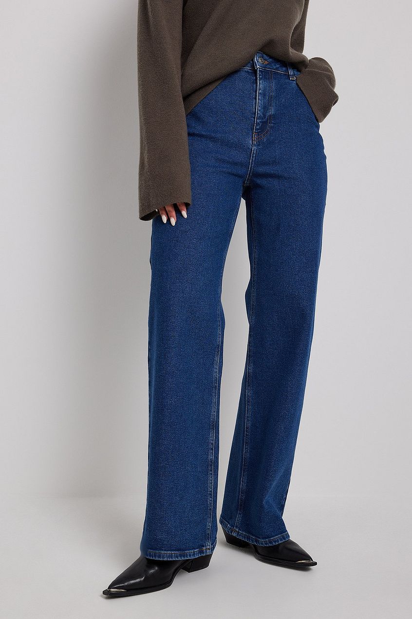 Wide-leg blue denim jeans from Ace Cart featuring a high-waist design for a relaxed, flared fit.