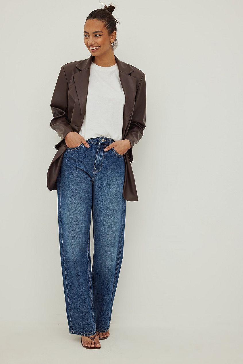 Relaxed fit denim jeans, stylish brown blazer, and casual white top - high-quality, versatile fashion pieces from Ace Cart.