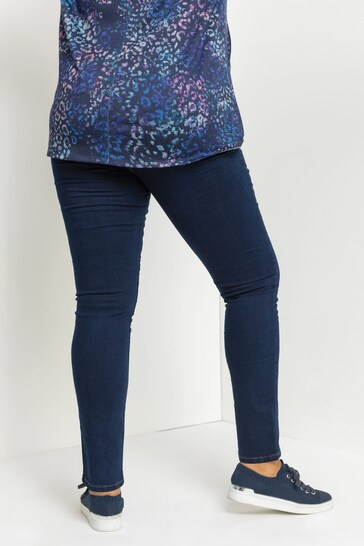 High waisted navy blue stretch jeggings with a floral printed top displaying a stylish and comfortable casual outfit.