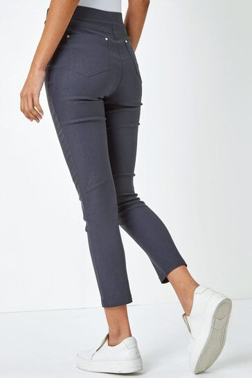 Stylish dark grey stretch jeggings with ripped knees, perfect for a casual chic look from the Ace Cart store.