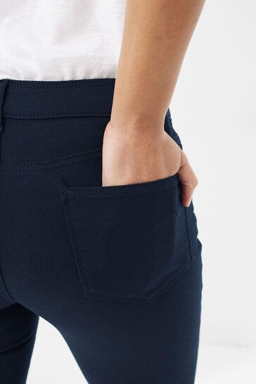 Navy blue five-pocket stretch jeggings with high waistline and ripped knee detail, displayed on a white background.