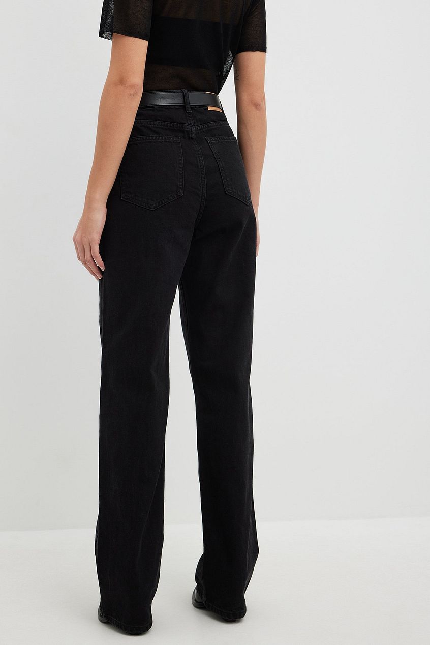 High-waisted black denim jeans with a wide leg silhouette.