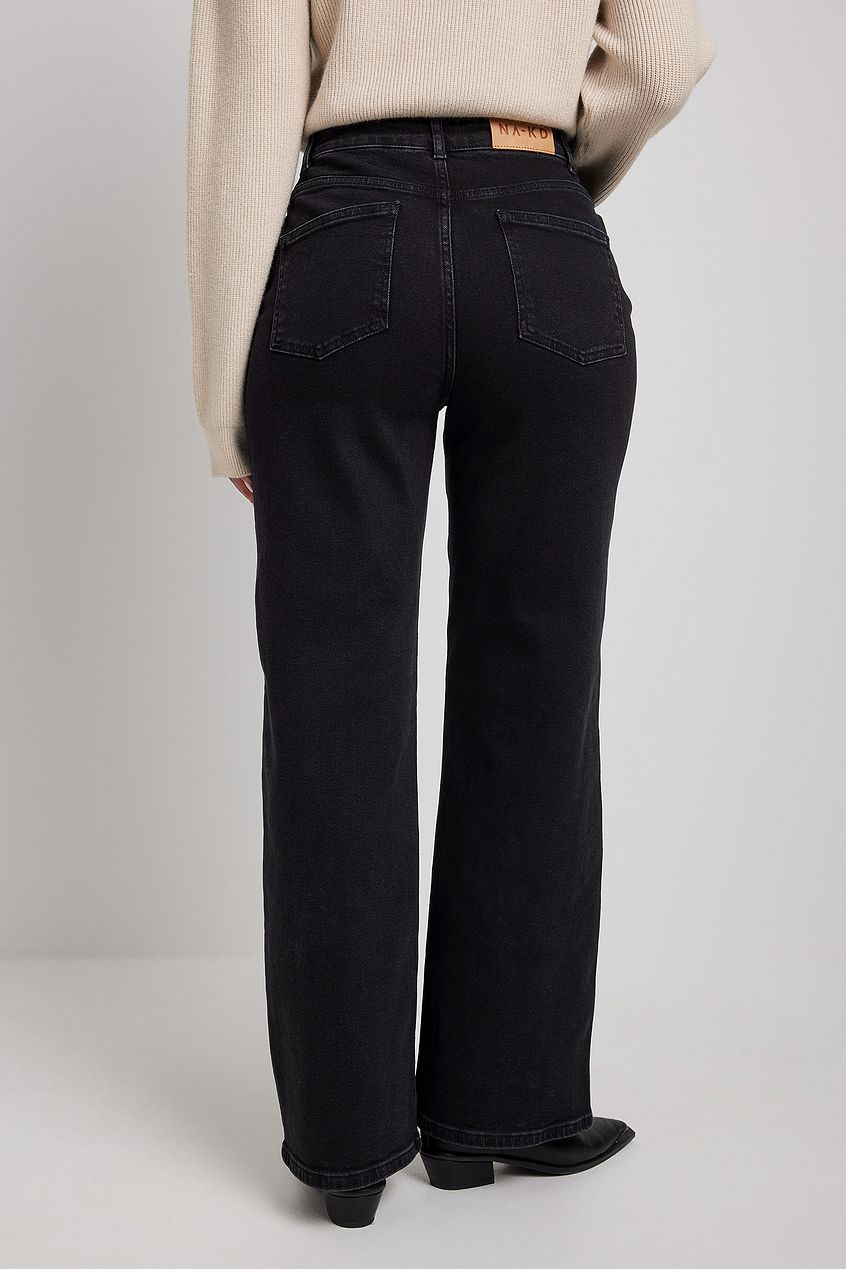 Wide leg black denim jeans with high waistline and back pocket detailing from Ace Cart.